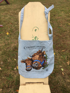 2019 Common Ground Country Fair single strap, cross-shoulder journey bag. Dexter Heifers design. Color light blue